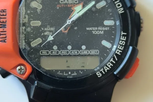 Watch LCD showing a few active segments after correct pad placement.