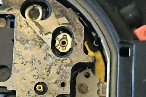 Top metal plate markings and altimeter sensor ribbon cable connection.
