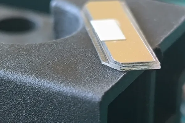 Close-up of LCD L-shaped section and degraded ITO conductive strips.